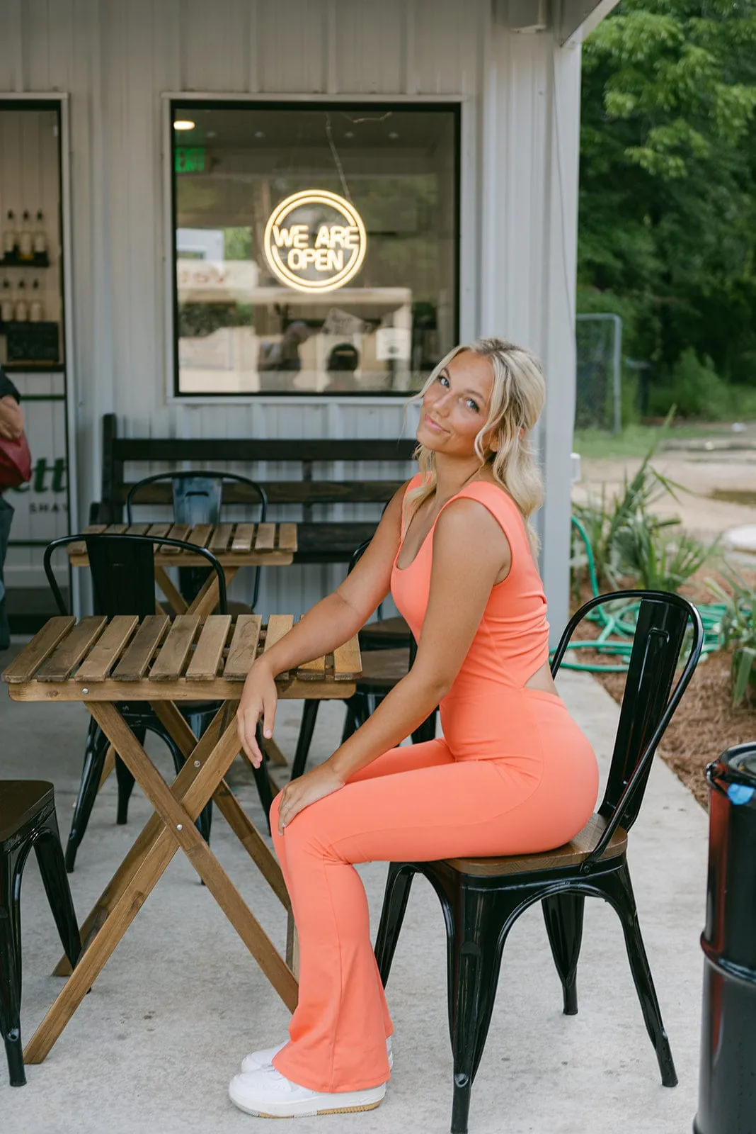 Coral Twisted Back Flare Athletic Jumpsuit