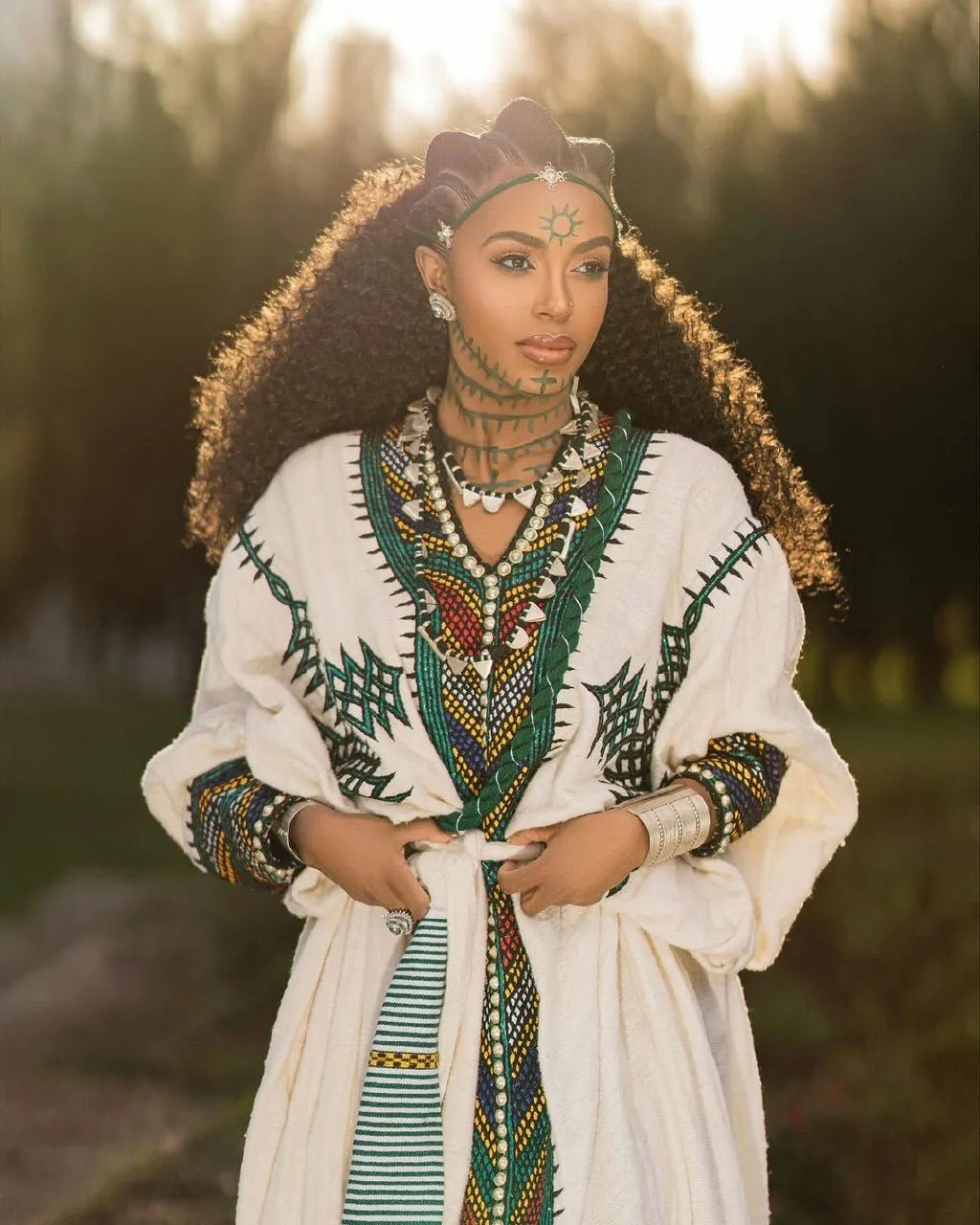 Silver Splendor: Rhinestone bedazzled Elegance in Fetil Habesha Dress