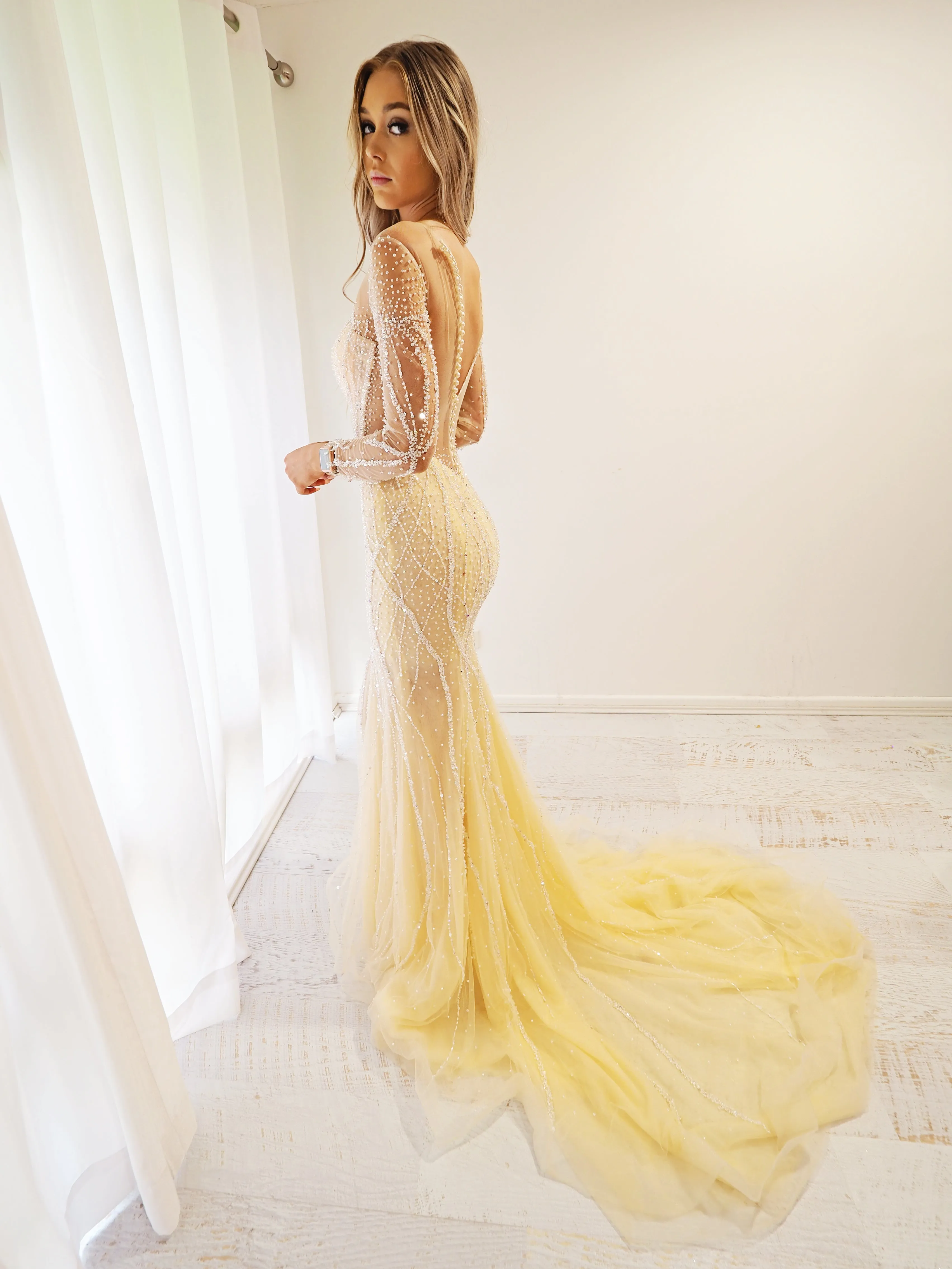 Sparkling Gold Beaded Deep V Mermaid Dress with long sleeves.